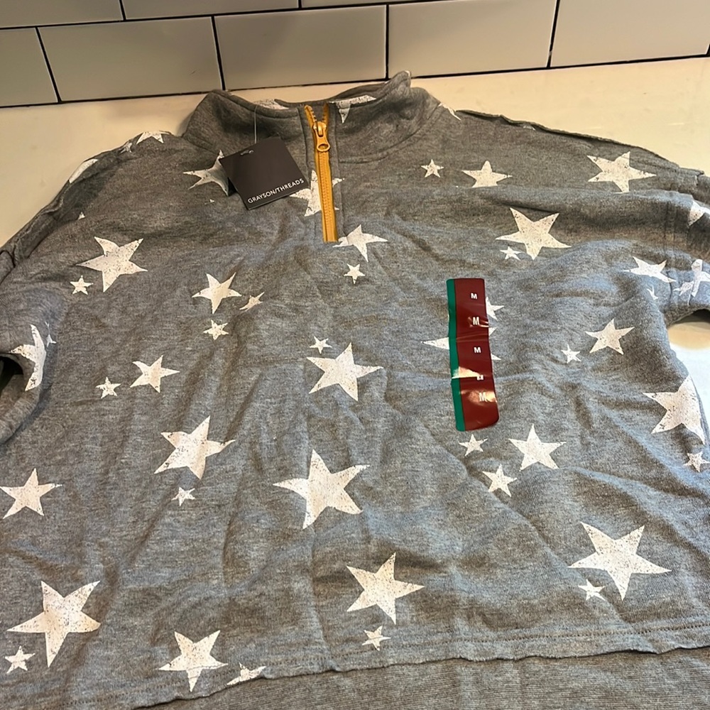 BNWT Grayson Threads Zipper sweatshirt. Grey with white stars. Size Medium